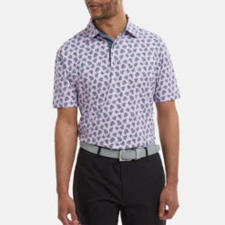 FootJoy Shadow Palm Print Pique Golf Polo Shirt 11 FootJoy Shadow Palm Print Pique Golf Polo Shirt -Golf Apparel Shop FootJoy SS22 Shadow Palm Print Pique Golf Polo Shirt Lavender Navy 88373 model 1